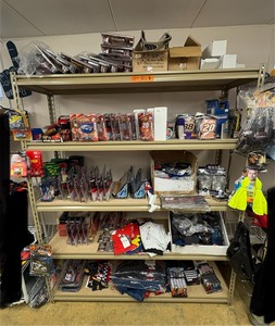 lot 120 image: NASCAR lighters, cars, shirts, can coolers, blankets, flasks, desk set, hats, and license plates