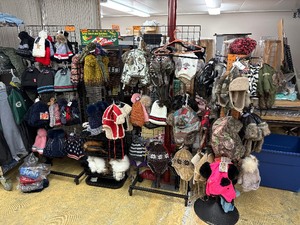 lot 122 image: Winter hats. (4) Display racks included