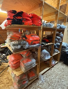 lot 136 image: 3 shelves of camoorange hunting gear