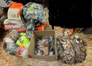lot 138 image: Camo jackets and hats
