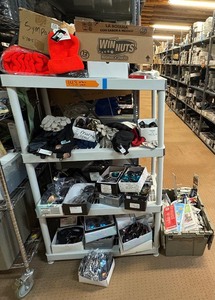 lot 143 image: Hats, gloves, sunglasses, chargers, keychains