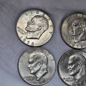 lot 109 image: 10-Ike Dollars