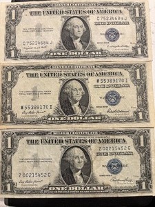 lot 10 image: 1935 Blue Seal $1 Dollar Silver Certificates