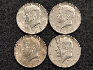 lot 46 image: 1964 and 1964-D Kennedy Half Dollars