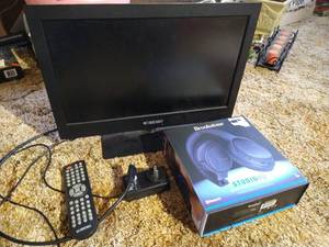 lot 68 image: 18 TV & New Brookstone Headphones