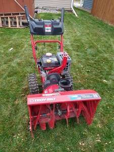 lot 218 image: Troy-Bilt 26 Electric Start Snowblower