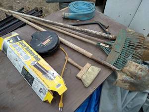 lot 233 image: Misc Tools on Table - Hose, Shovels, Etc