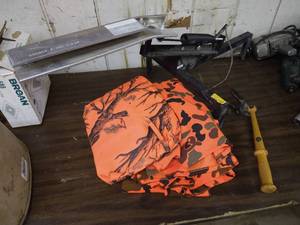lot 334 image: Hunting Lot - Clay Pigeon Throwers, Rain Camo & Other Camo Clothes