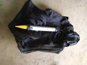 lot 408 image: Cox Caulk Gun & Under Armor Bag