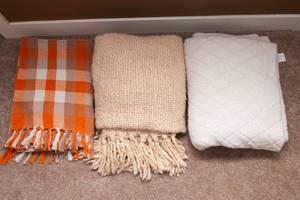 lot 88 image: Set of Three Throw Blankets