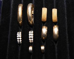 lot 74 image: Five Pairs Gold Tone Earrings  Hoop Styles