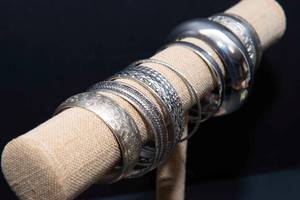 lot 127 image: Variety of Metal Bangles and Cuffs