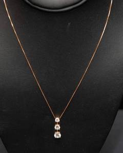 lot 10 image: 14K Gold Necklace with Rhinestone Pendant