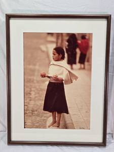 lot 7 image: Framed Photograph of a Girl Holding a Tomato and Onion by Minnesota Native Photojournailst Paul Chesley - Approx. 20 12 x 26 12