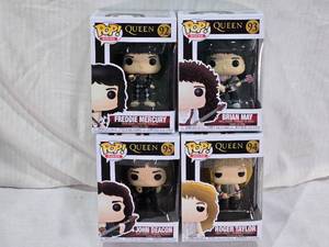 lot 26 image: Queen Pop Rocks Vinyl Figures Set featuring Freddie Mercury, Brian May, John Deacon, and Roger Taylor