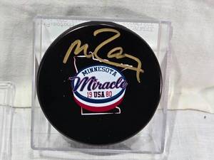 lot 33 image: Mike Ramsey Autographed Minnesota Miracle Hockey Puck with COA