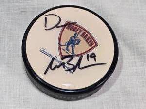 lot 37 image: Drew LeBlanc Auto Hobey Baker Memorial Award Commemorative Hockey Puck St. Cloud State University
