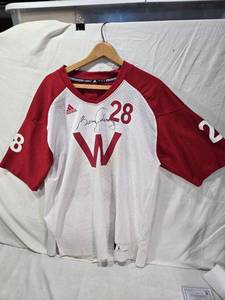 lot 42 image: Barry Alvarez Signed Adidas Montee Ball Wisconsin Badgers football jersey