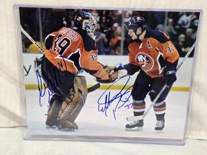 lot 52 image: Autographed New York Islanders Photo by Mark Parrish & Rick DiPietro with Certificate of Authenticity