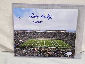 lot 55 image: Autographed Rudy Ruettiger USA Football Stadium Photo with PSADNA Authentication