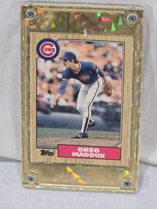 lot 103 image: Greg Maddux Rookie 1987 Topps #70T in Screw Down One Touch - Chicago Cubs Baseball Card