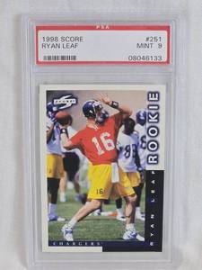 lot 106 image: Ryan Leaf Rookie 1998 Score #251 PSA Graded MINT 9 - Chargers Football Card