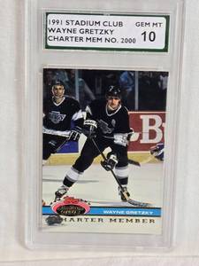 lot 121 image: Wayne Gretzky 1991 Stadium Club Charter Member #2000 Supreme SP Authentication Graded 10 - Los Angeles Kings Hockey Card