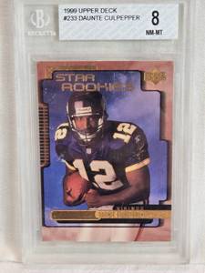 lot 126 image: Daunte Culpepper 1999 Upper Deck Star Rookies #233 Beckett Graded 8 - Minnesota Vikings Football Card