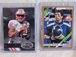 lot 168 image: Lot of 2 Russell Wilson Football Cards Featuring 2019 Panini Donruss Press Proof and 2012 Metal Universe
