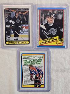 lot 175 image: Lot of 3 Wayne Gretzky Hockey Cards including O-Pee-Chee and Topps sets with highlights and milestone stats