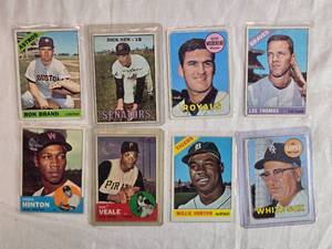 lot 181 image: Lot of 8 Vintage Baseball Cards from the 1960s Featuring Ron Brand, Dick Nen, Dave Morehead, Lee Thomas, Chuck Hinton, Bob Veale, Willie Horton, and Al Lopez.