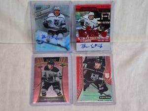 lot 204 image: Lot of 4 Blake Lizotte Hockey Cards featuring Rookie, Auto, and Holo. Contains cards from sets including Ice Premieres 9399 and Credentials 165