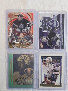lot 222 image: Lot of 4 Hockey Cards Featuring Felix Potvin, Dominik Hasek, Ed Belfour, John Vanbiesbrouck