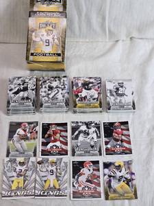 lot 252 image: Lot of 2020 Leaf Draft Football Cards Featuring Joe Burrow, Justin Jefferson, and Jalen Hurts and Empty Box