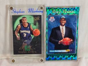 lot 259 image: Lot of 2 Basketball Cards Featuring Stephon Marbury 96-97 Fleer All Rookie and Alonzo Mourning NBA Draft