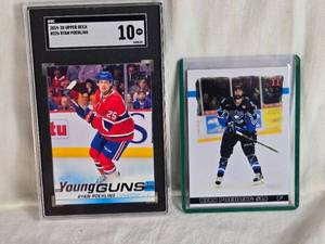 lot 267 image: Lot of 2 Ryan Poehling Hockey Cards including 2019-20 Upper Deck Young Guns SGC Graded 10 and Lincoln Stars Card.
