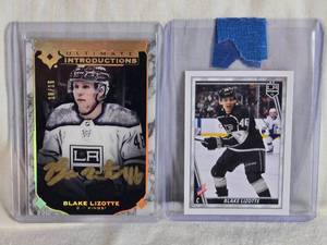lot 272 image: Lot of 2 Blake Lizotte Hockey Cards Including Upper Deck Ultimate Introductions Auto Numbered 1010 and Topps NHL Sticker Album Card