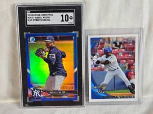 lot 275 image: Lot of 2 Russell Wilson Baseball Cards including 2018 Bowman Chrome Prospects Blue Refractor Numbered 106150 SGC Graded 10 and Topps Pro Debut.