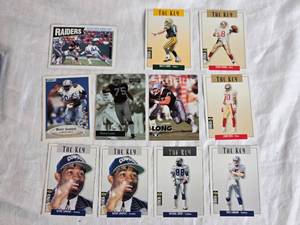 lot 280 image: Lot of 11 Football Cards Featuring Brett Favre, Steve Young, Deion Sanders, Jerry Rice, and Barry Sanders