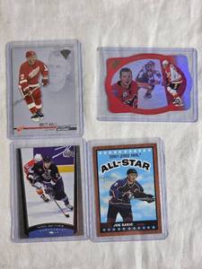 lot 287 image: Lot of 4 Hockey Cards Featuring Theoren Fleury Die Cut, Joe Sakic All-Star, Brett Hull, and Mark Messier