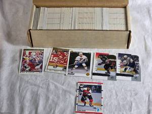 lot 312 image: 10 Box of Hockey Cards Featuring Various Years and Brands - O-Pee-Chee 92, 1990 Score, 1992 Upper Deck, 2001 Upper Deck - Uncounted