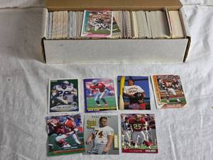 lot 322 image: Box of Football Cards Various Brands and Years including sets like Fleer 90, Score 91, Skybox and Pro Set 93 and more - Uncounted Unsearched