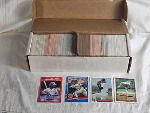 lot 327 image: Box of 4 Baseball Cards Featuring Various Brands and Years Donruss 91, Donruss 90, Fleer Excel 93-94, Topps - Uncounted Unsearched