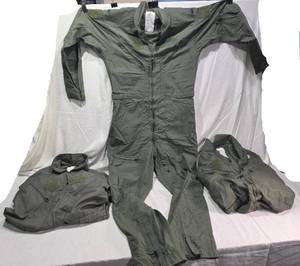 lot 336 image: Lot of Military Flight Coveralls Including CWU-27P and Fire-Resistant Types - Sizes 40L, 44R, 42 Regular - Green and 1 Tan