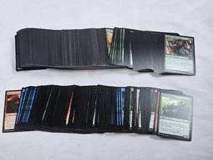 lot 337 image: Lot of Magic The Gathering Trading Cards Assorted Colors and Sets from 2017-2020 - Uncounted Unsearched