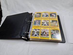 lot 345 image: Large Binder of 1991 Fleer Baseball Cards Featuring Players Like Jose Canseco, Dave Henderson, and Orel Hershiser