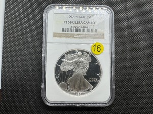lot 16 image: 1997 Proof 1 Oz. Silver American Eagle NGC PF69 Ultra Cameo - NGC Price Guide is $135