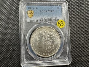lot 59 image: 1883-O Morgan Silver Dollar PCGS MS62- PCGS Price Guide is $85
