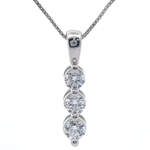 lot 23 image: 0.50 Carat Diamond Three-Stone Linear Pendant in White Gold VIDEO