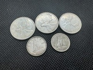 lot 26 image: Three 80% Silver Canadian Quarters 1960, 1961, and 1965 Two 80% Silver Canadian Dimes 1956 and 1967 -- 0.57 Oz. of Silver